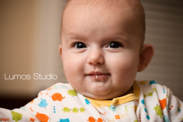 Baby blowing a spit bubble