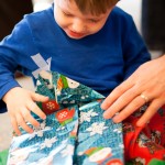 Ethan opening Christmas presents