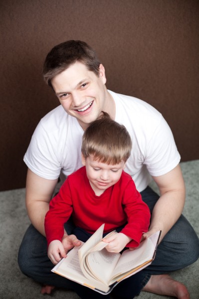 Ethan reads with his daddy