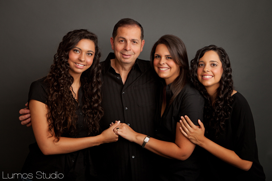 Portrait of a father and his three daughters